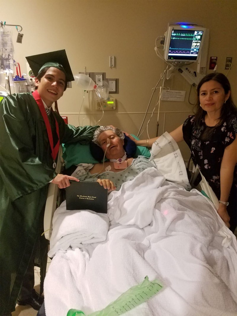 Martin Mata with his son and wife